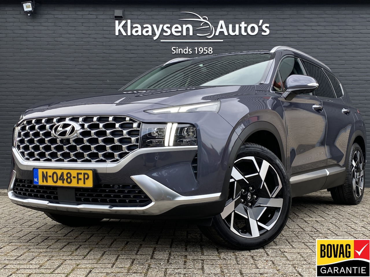 Hyundai Santa Fe - 1.6 T-GDI HEV 230 pk Premium AUT. | dealer onderh. | leder inter. | 360 camera | trekhaak - AutoWereld.nl