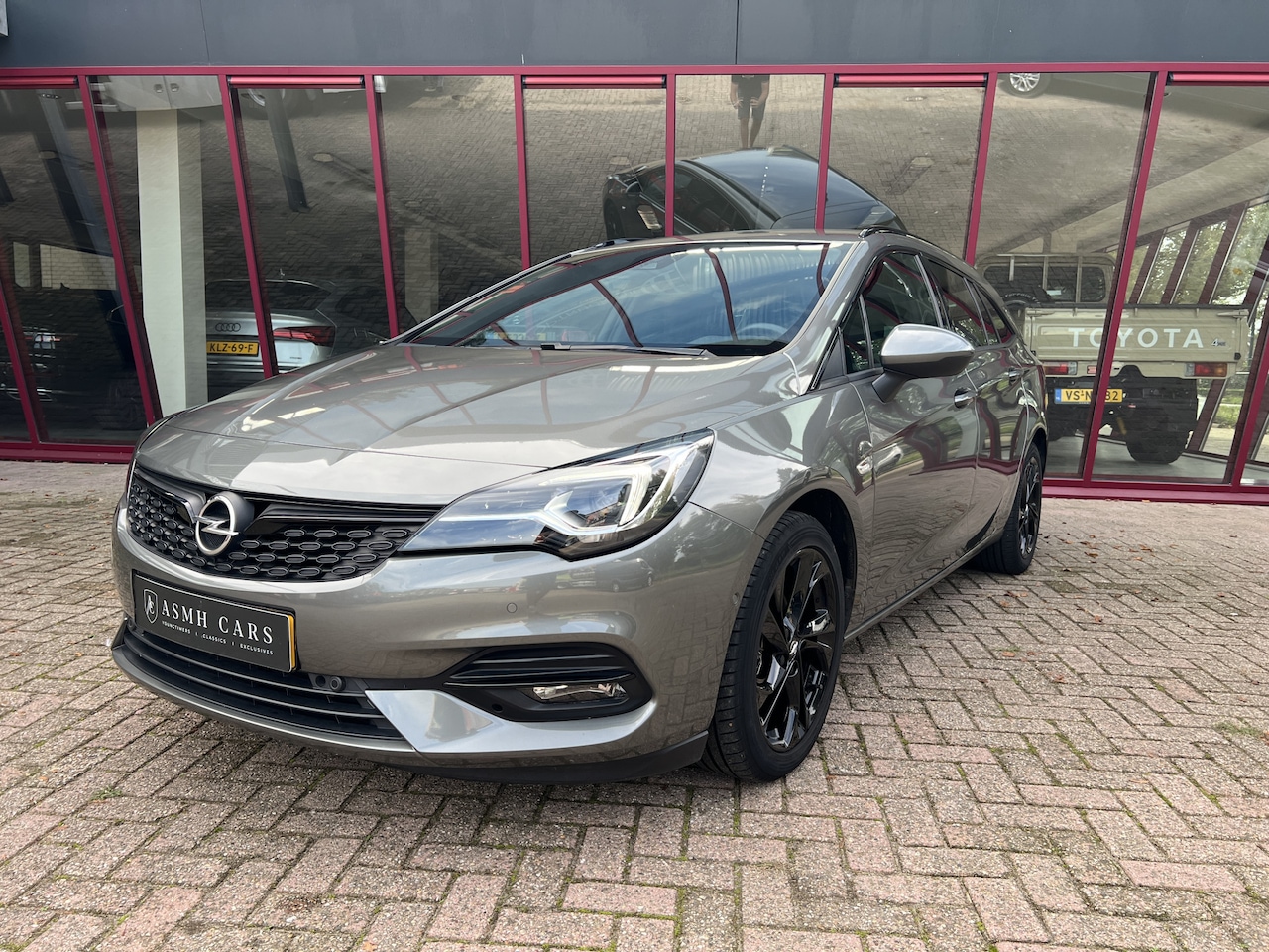 Opel Astra Sports Tourer - 1.2 Ultimate | Trekhaak | Camera | Carplay | Stoel/Stuurverw. | Keyless | - AutoWereld.nl