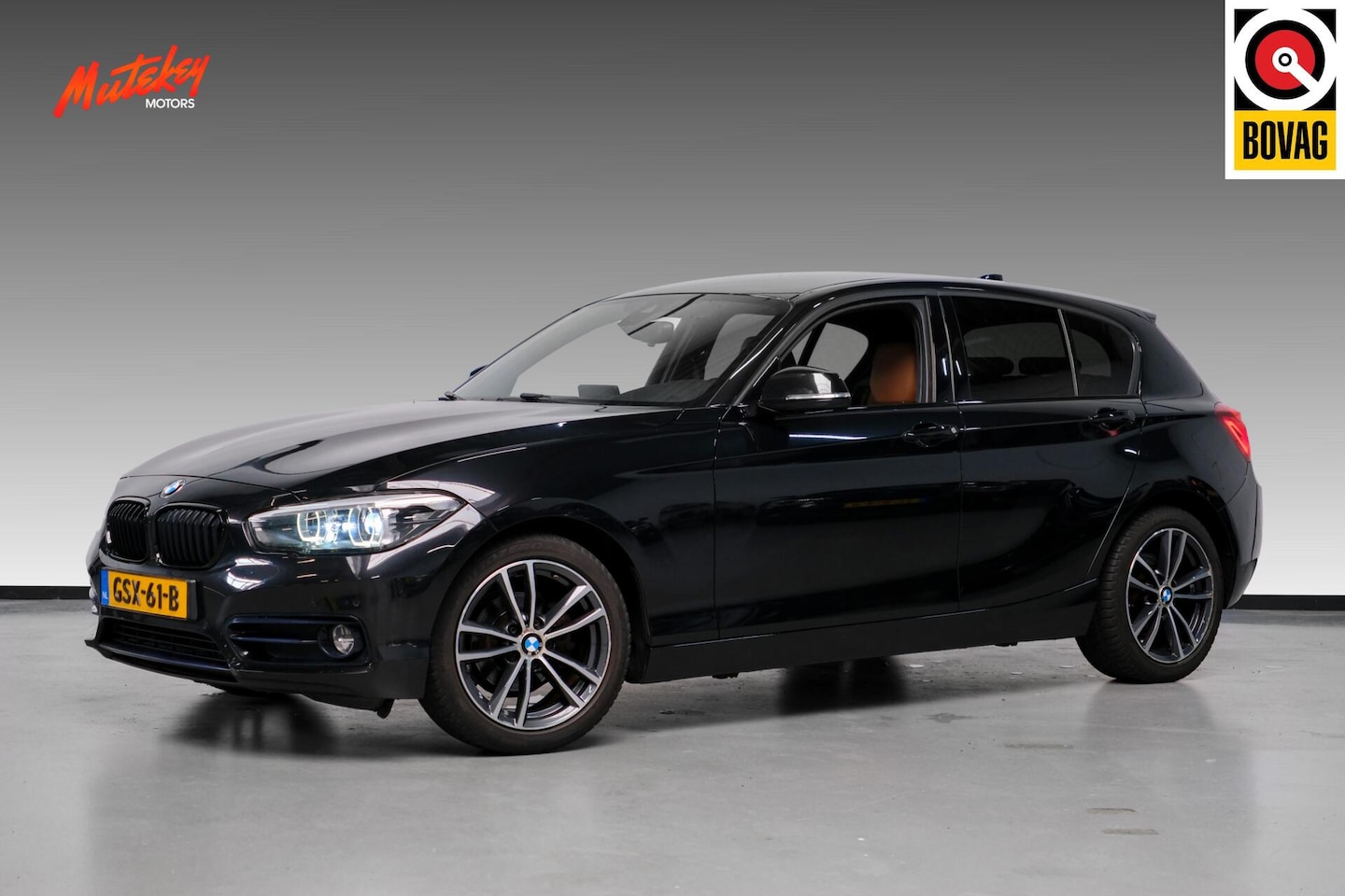 BMW 1-serie - 118i Edition Sport Line Shadow | Cognac - AutoWereld.nl