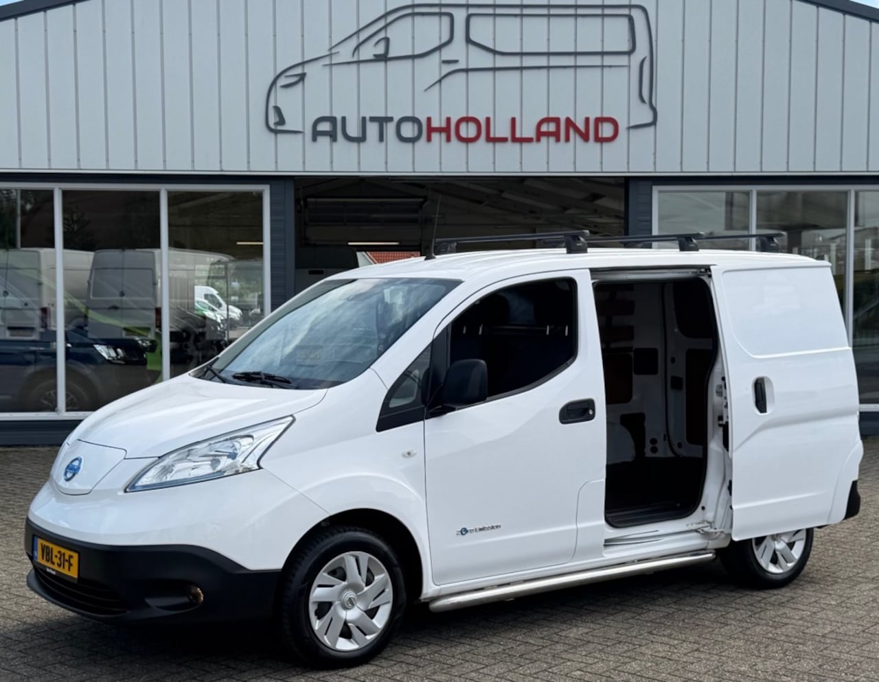Nissan e-NV200 - ZERO EMISSIE 40KWH 80KW 120PK AIRCO/ NAVIGATIE/ CRUISE CONTROL/ CAMERA/ IMPERIAAL/ 100% DE - AutoWereld.nl