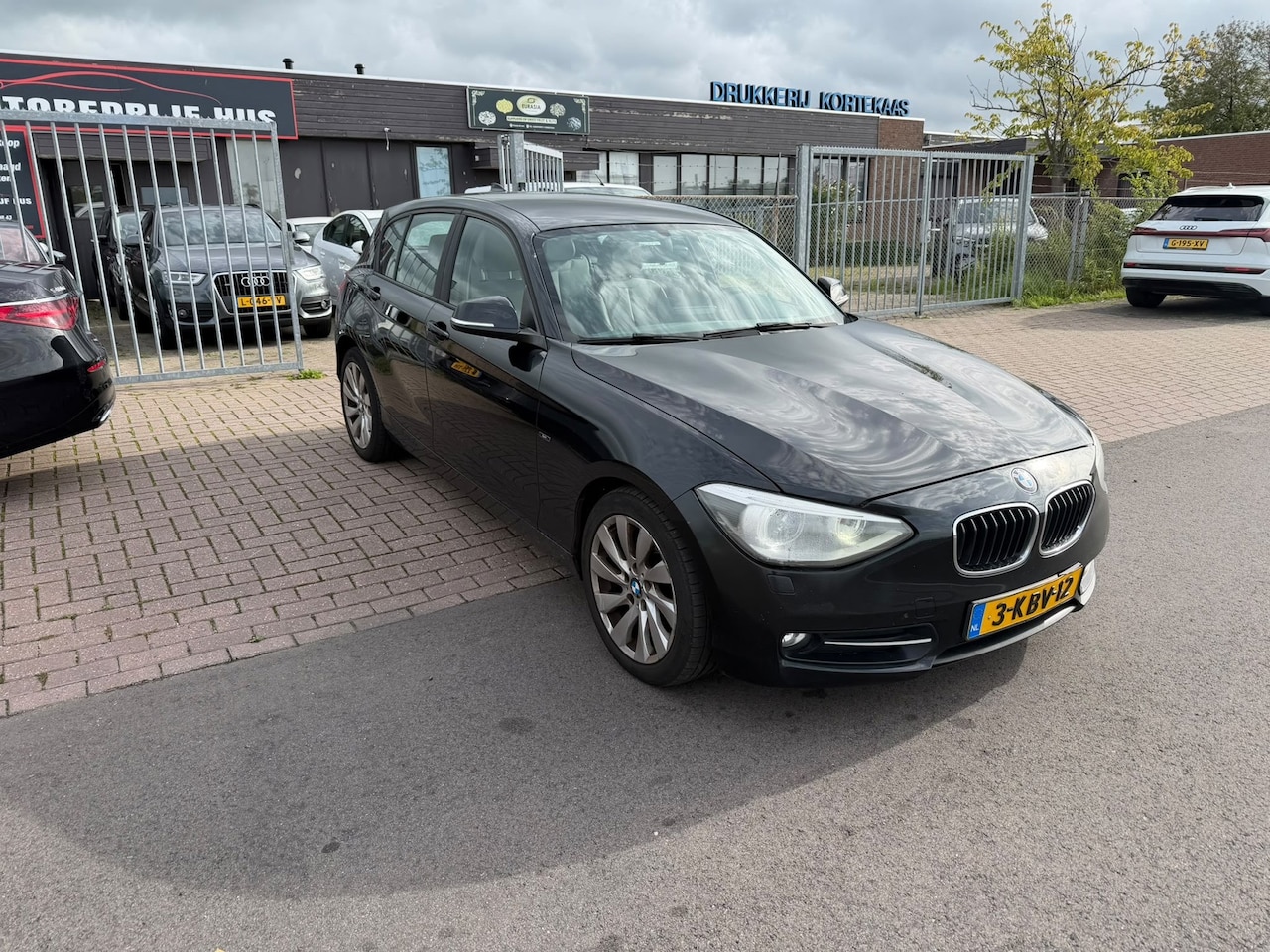 BMW 1-serie - 118d Business Sport XENON/NAVI/CLIMA - AutoWereld.nl