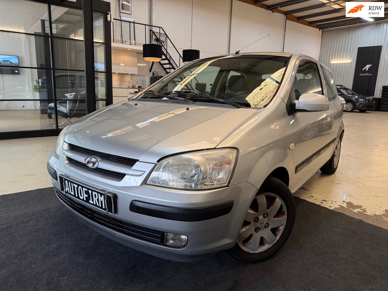 Hyundai Getz - 1.3i Dynamic Sky Dealer onderhouden Lage kilometerstand Airco Panoramadak Elektrisch verst - AutoWereld.nl
