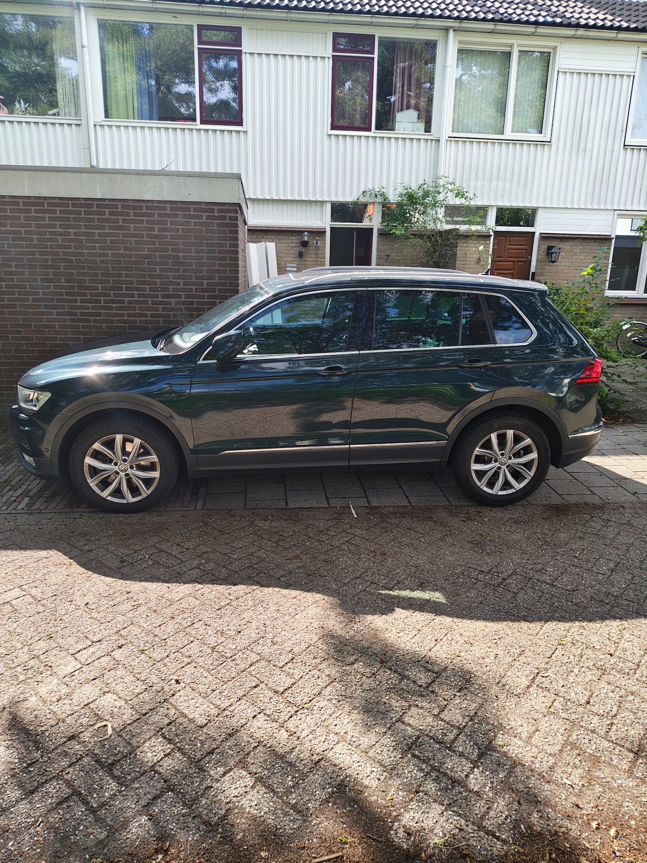 Volkswagen Tiguan - 2.0 TSI Highline 4Motion 1 - AutoWereld.nl