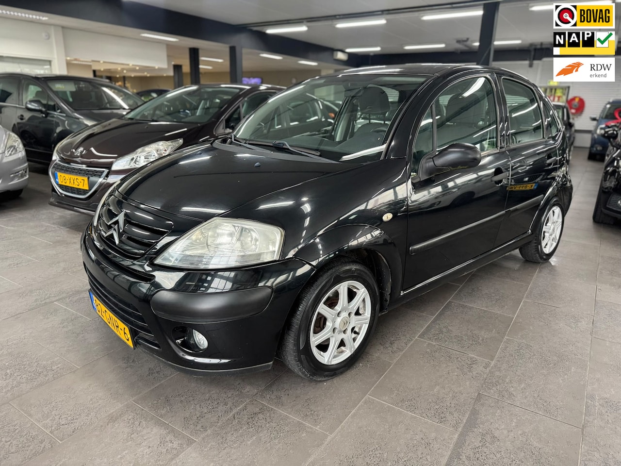 Citroën C3 - 1.4i Ligne Prestige airco elektrische ramen+spiegels lm-velgen 129dzkm - AutoWereld.nl