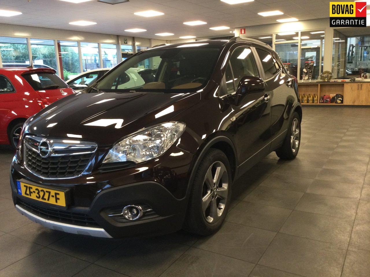 Opel Mokka - 1.4 T Cosmo Navi---PDC---Clima---Camera---Trekhaak---stuur / stoel verwarming---Leer - AutoWereld.nl