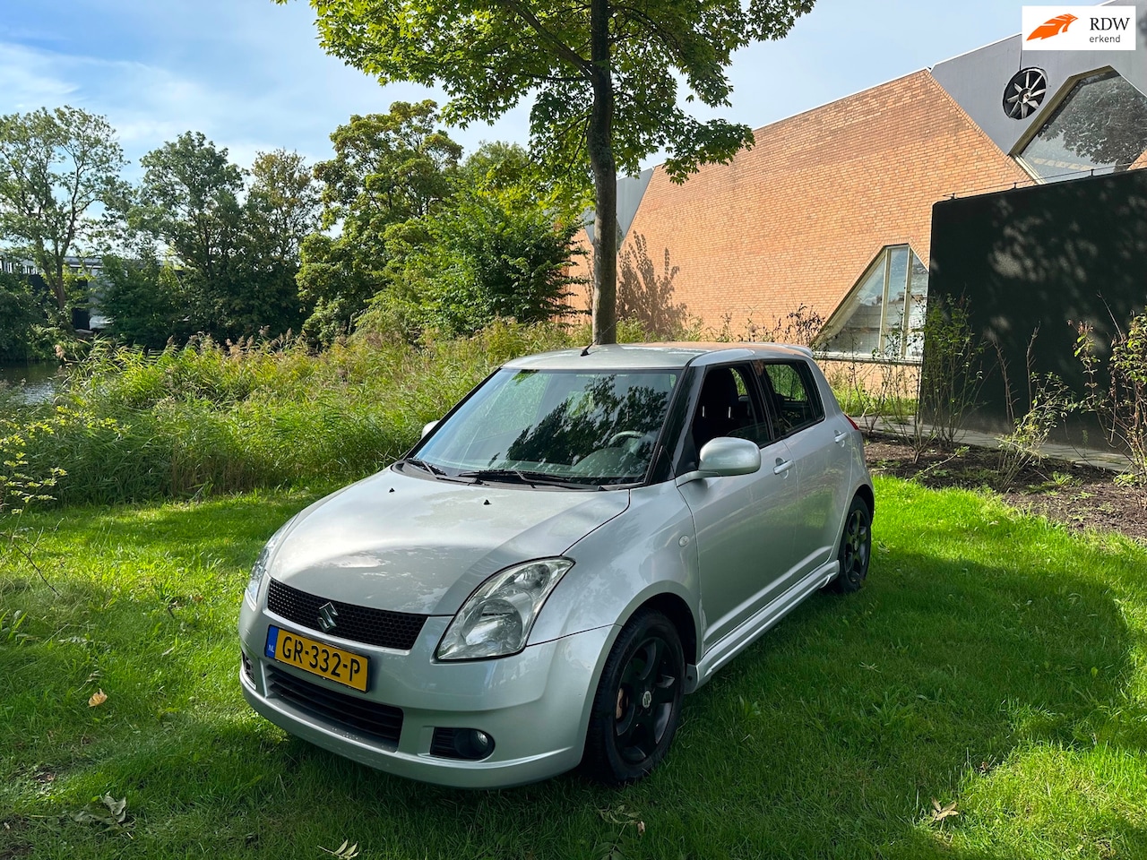 Suzuki Swift - 1.3 GA Airco Spoiler Sportief!!! - AutoWereld.nl