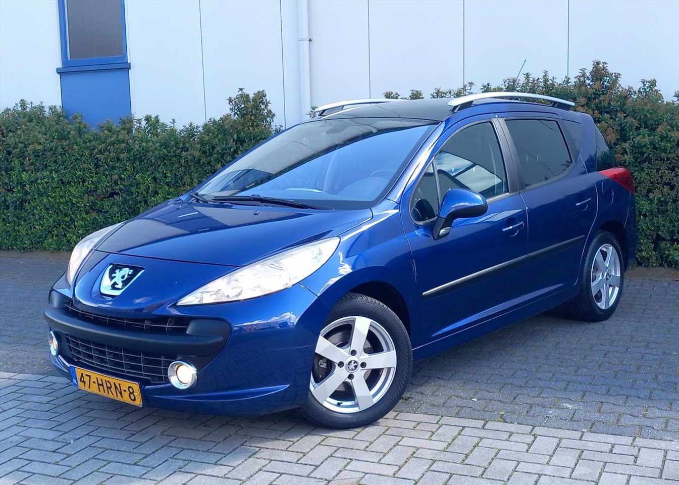 Peugeot 207 - 1.6 HDi XS 16V 110PK SW Panoramadak - AutoWereld.nl