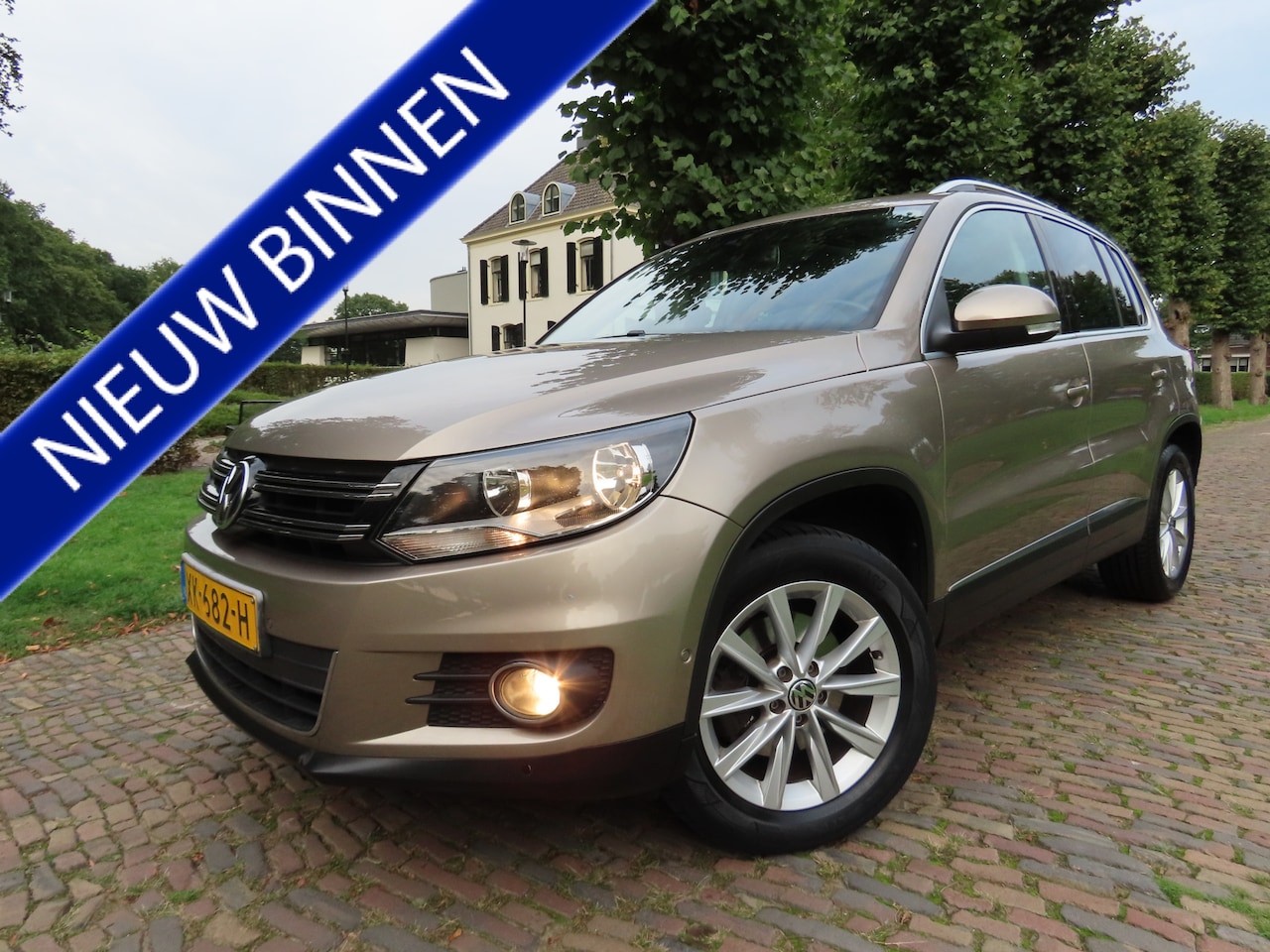 Volkswagen Tiguan - 1.4 TSI Track&Field 4Motion Leer Panoramadak/Schuif Parkassist Stoelverwarming Ecc Cruisec - AutoWereld.nl