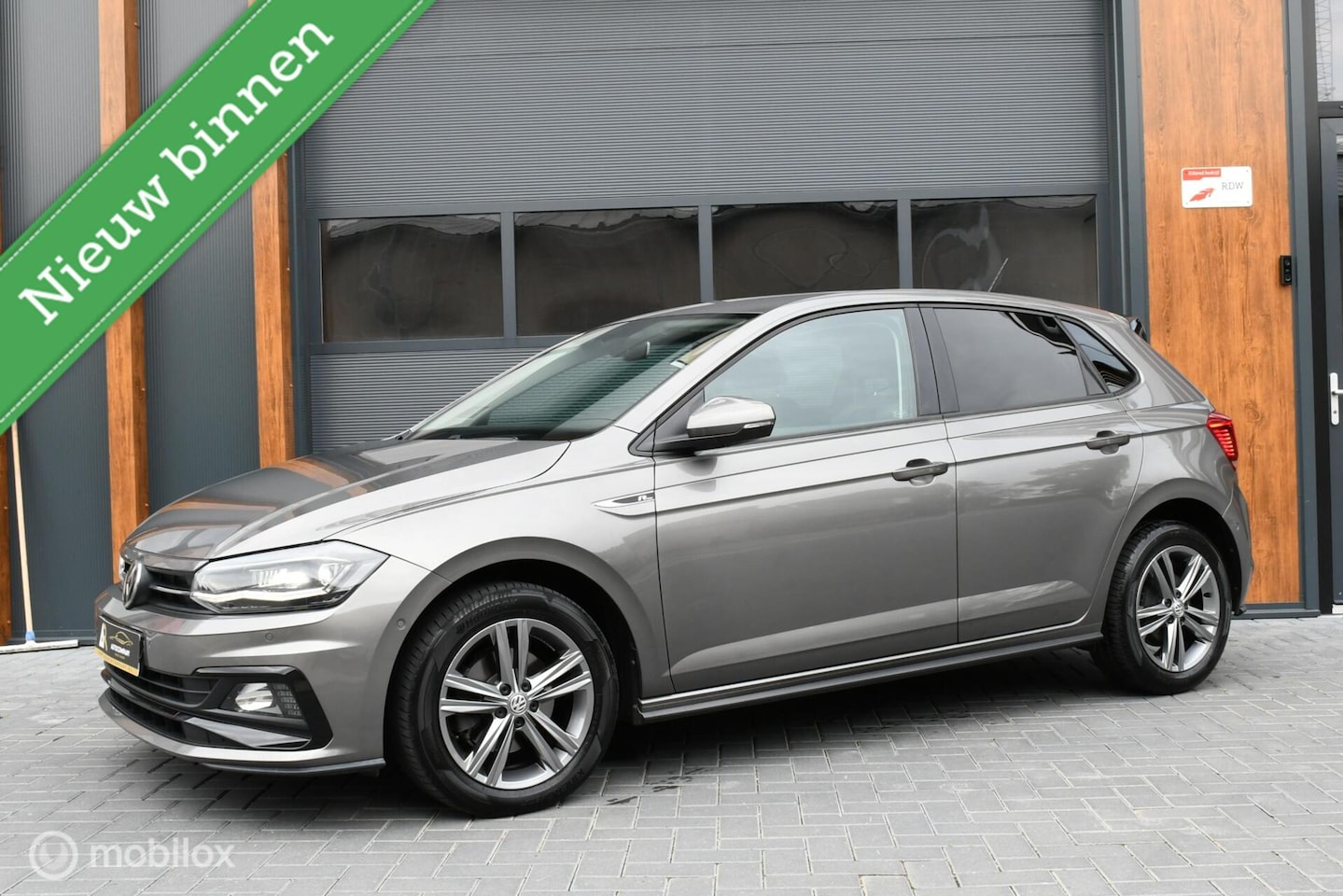 Volkswagen Polo - 1.6 TDI Highline Business R 1.6 TDI Highline Business R - AutoWereld.nl