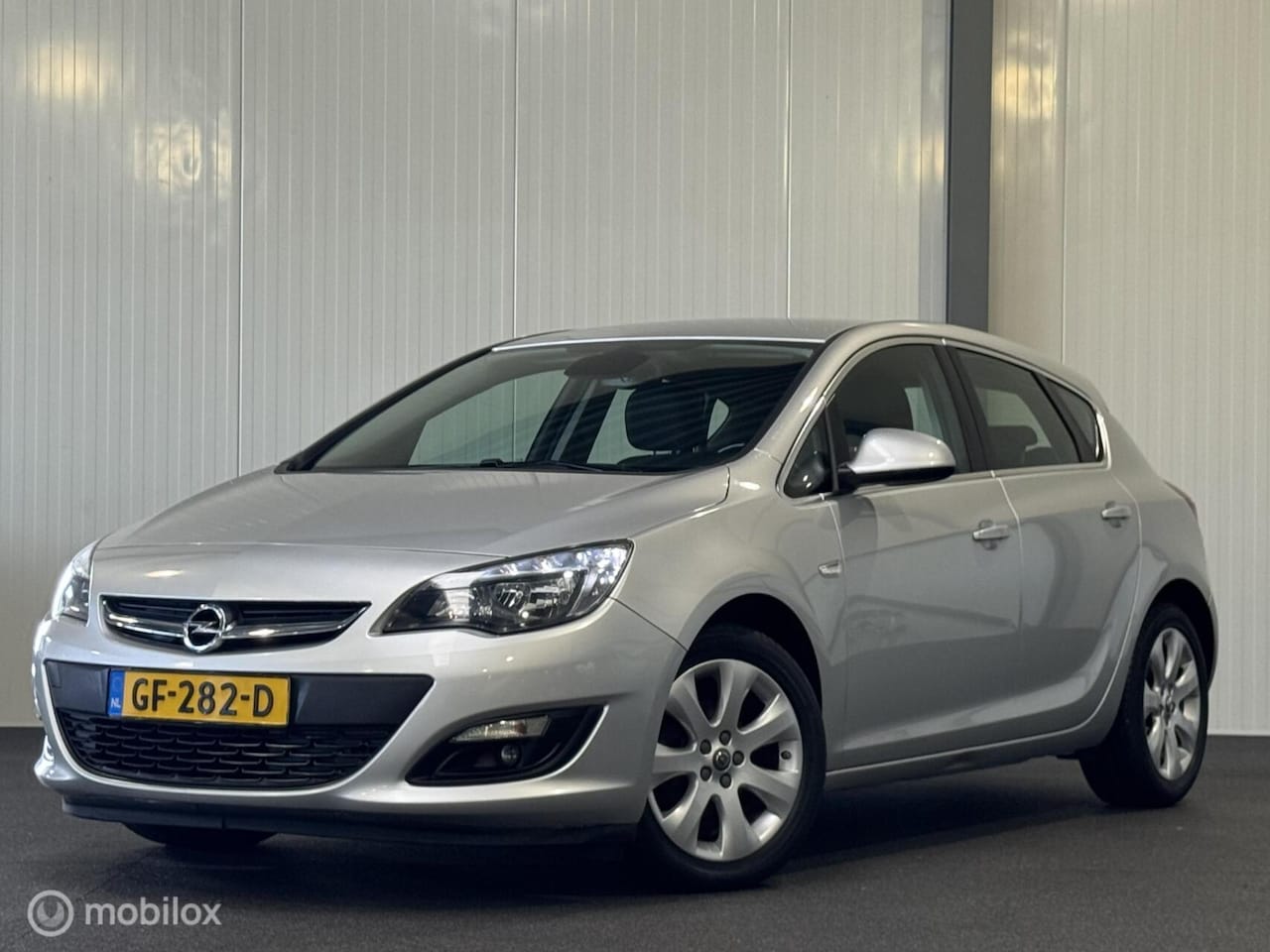 Opel Astra - 1.4 Turbo Blitz [ NAP cruise pdc LED ] - AutoWereld.nl
