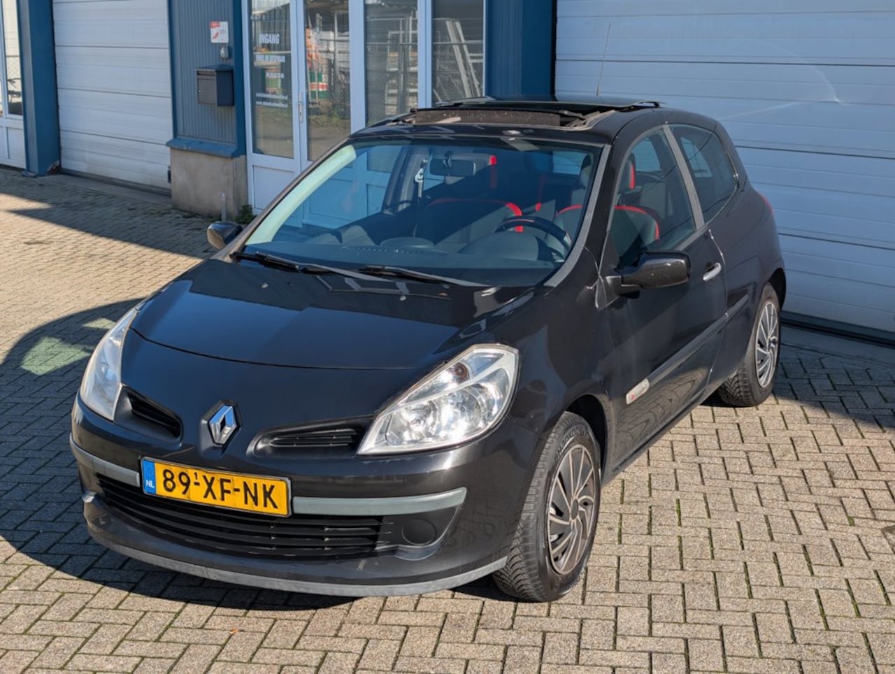 Renault Clio - 1.4-16V Rip Curl Airco Pano NAP - AutoWereld.nl