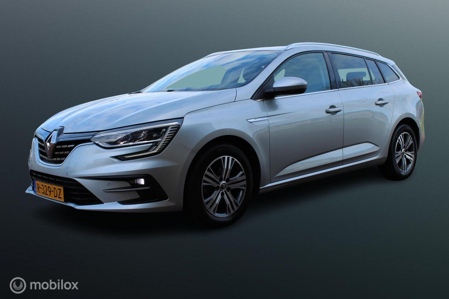 Renault Mégane Estate - 1.3 TCe Intens 1.3 TCe Intens 140 pk, Pdc voor + achter, Full led, App connect, Clima, Navi, Cruise, Half - AutoWereld.nl