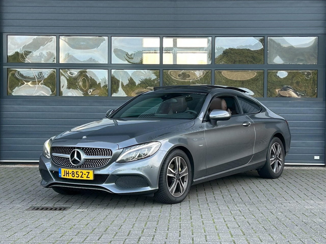 Mercedes-Benz C-klasse Coupé - 180 EDITION ONE I AUTOMAAT I SCHUIF/KANTELDAK I LEDEREN BEKLEDING I STOELVERWARMING - AutoWereld.nl