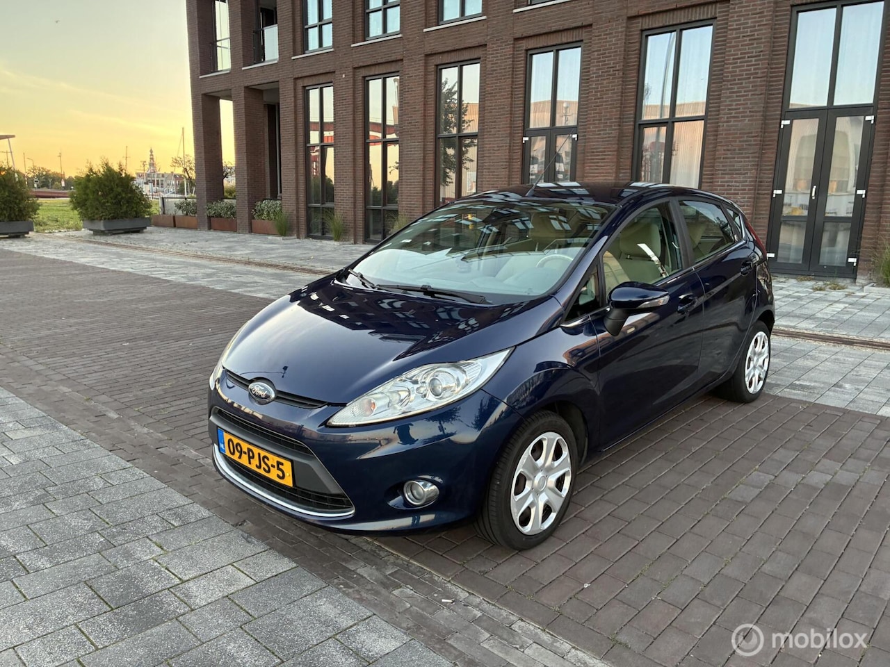 Ford Fiesta - 1.25 Ghia Clima Cruise PDC NAP ! - AutoWereld.nl
