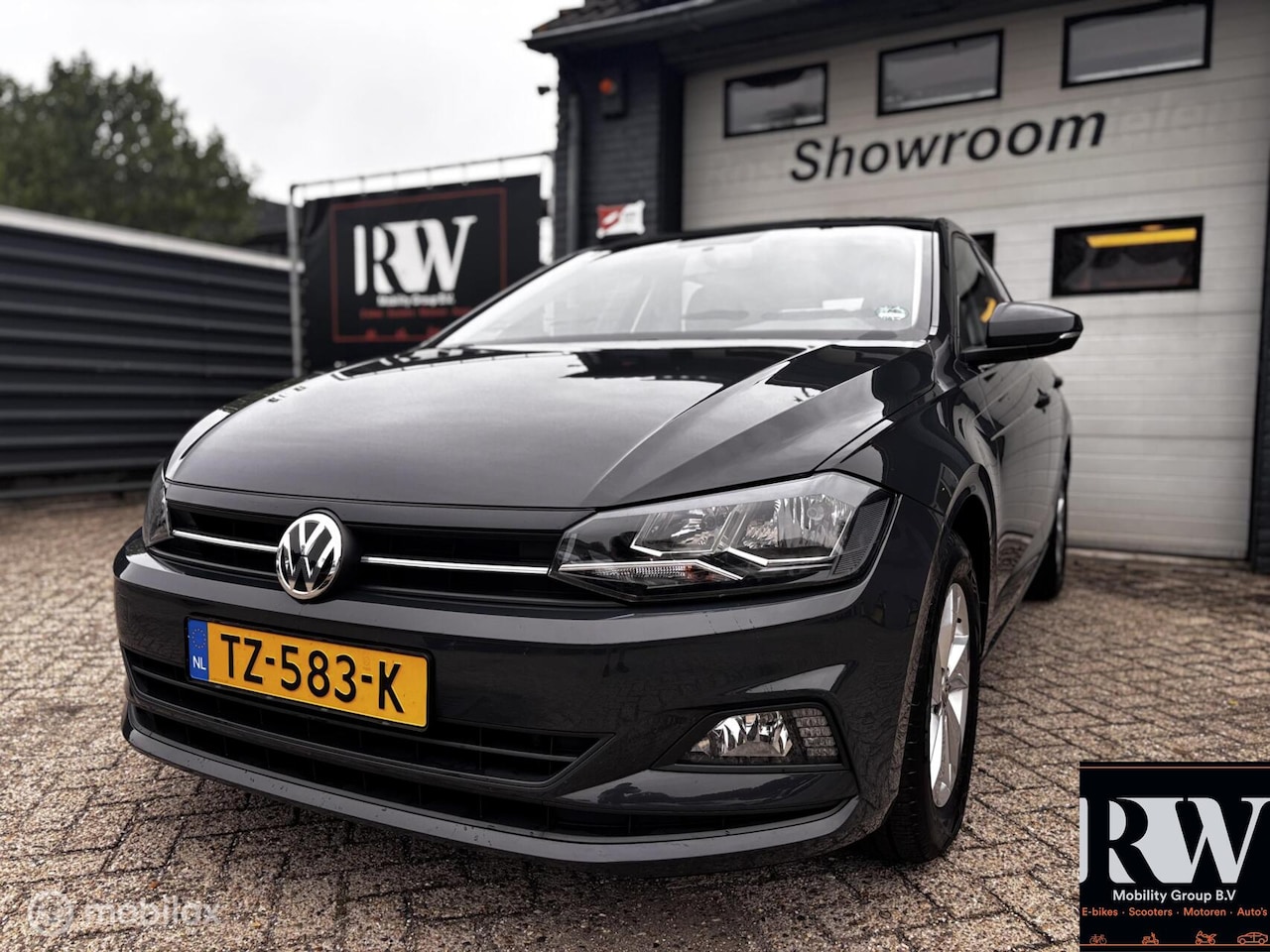 Volkswagen Polo - 1.0 TSI Beats *NAP*AIRCO*CRUISE*LM-VELGEN* - AutoWereld.nl