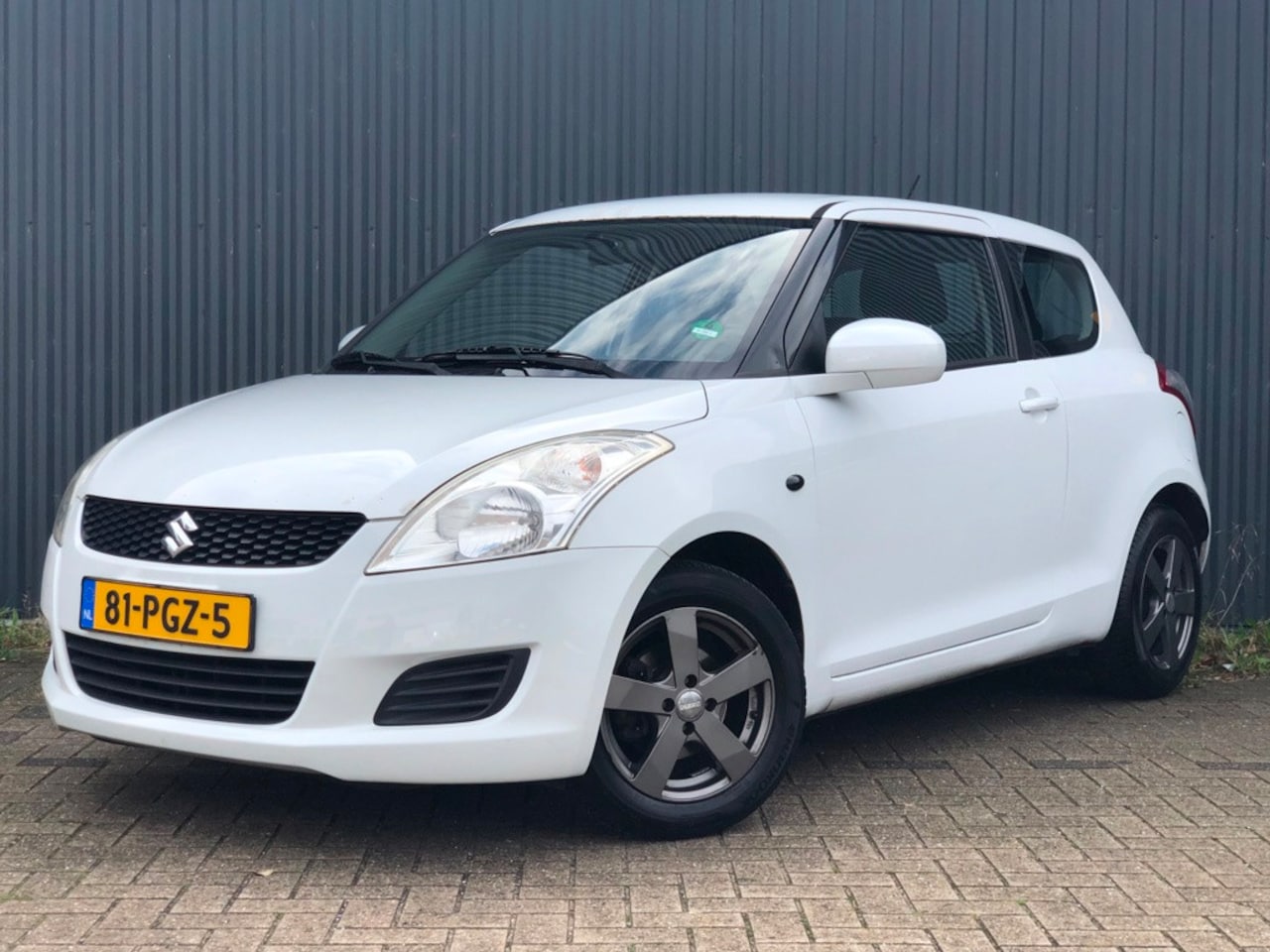 Suzuki Swift - 1.2 Comfort | Navi | Bluetooth | Airco | - AutoWereld.nl