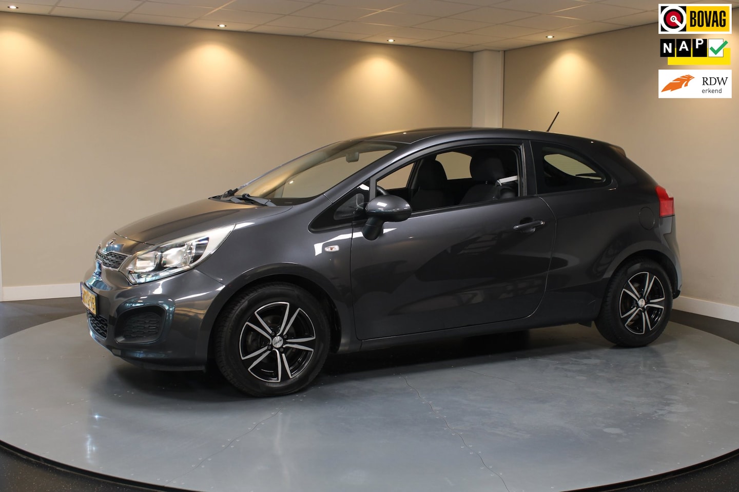 Kia Rio - 1.2 CVVT Comfort Pack *Dealer OH* All-seasons|Airco|Navi|BT|Isofix|Lm-Velgen|NAP - AutoWereld.nl