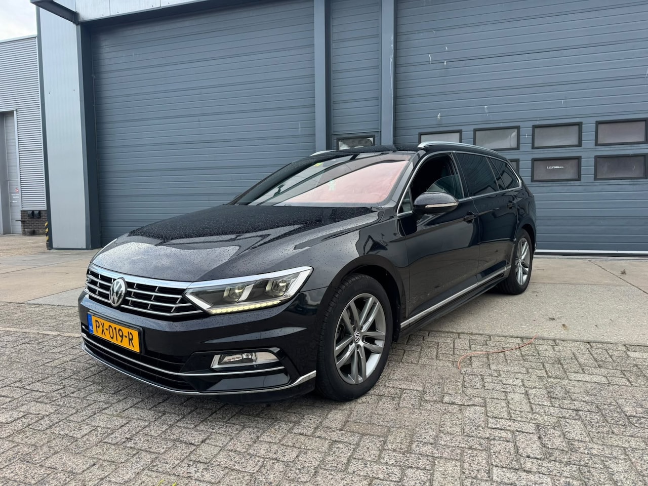 Volkswagen Passat Variant - 2.0 TDI Highline R-line - AutoWereld.nl