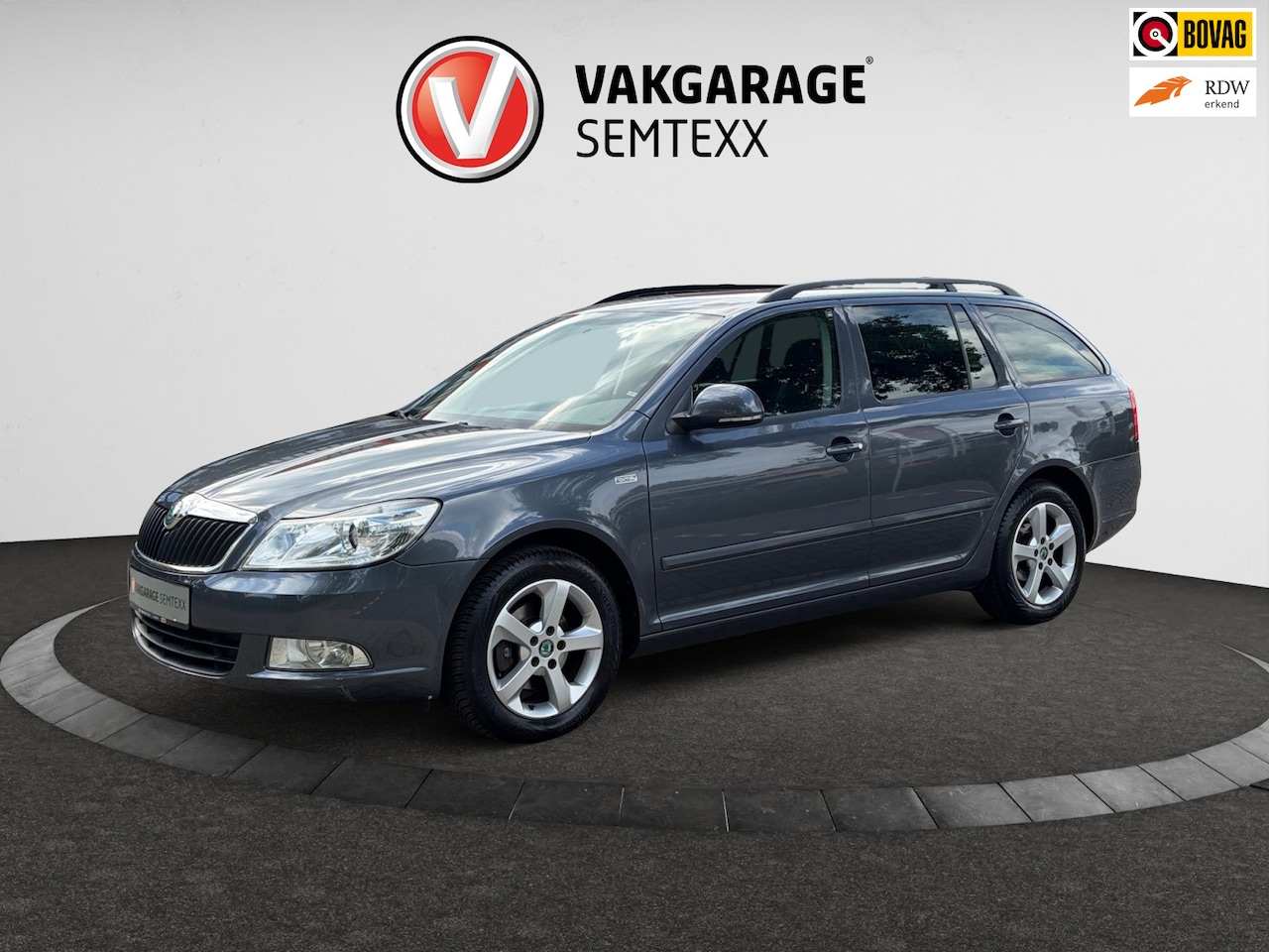 Skoda Octavia Combi - 1.2 TSI Comfort | Clima | Cruise | Navi | PDC Achter | Dakrails | Boekjes/Historie Aanwezi - AutoWereld.nl