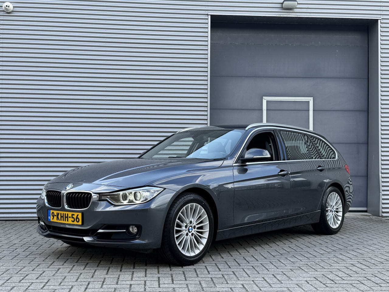 BMW 3-serie Touring - 320i High Executive I Sport-Line I Leder I Navi - AutoWereld.nl