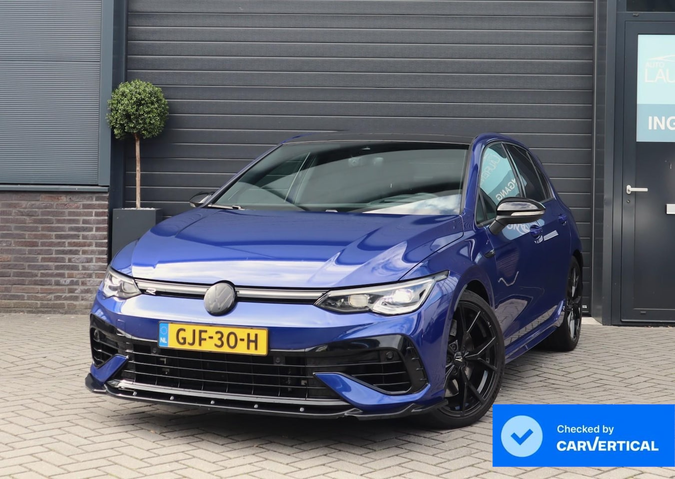 Volkswagen Golf - 2.0 TSI R 4Motion | Akra | Leer |  Pano | R sportstoelen | Memory Seats |  Stoel verwarmin - AutoWereld.nl