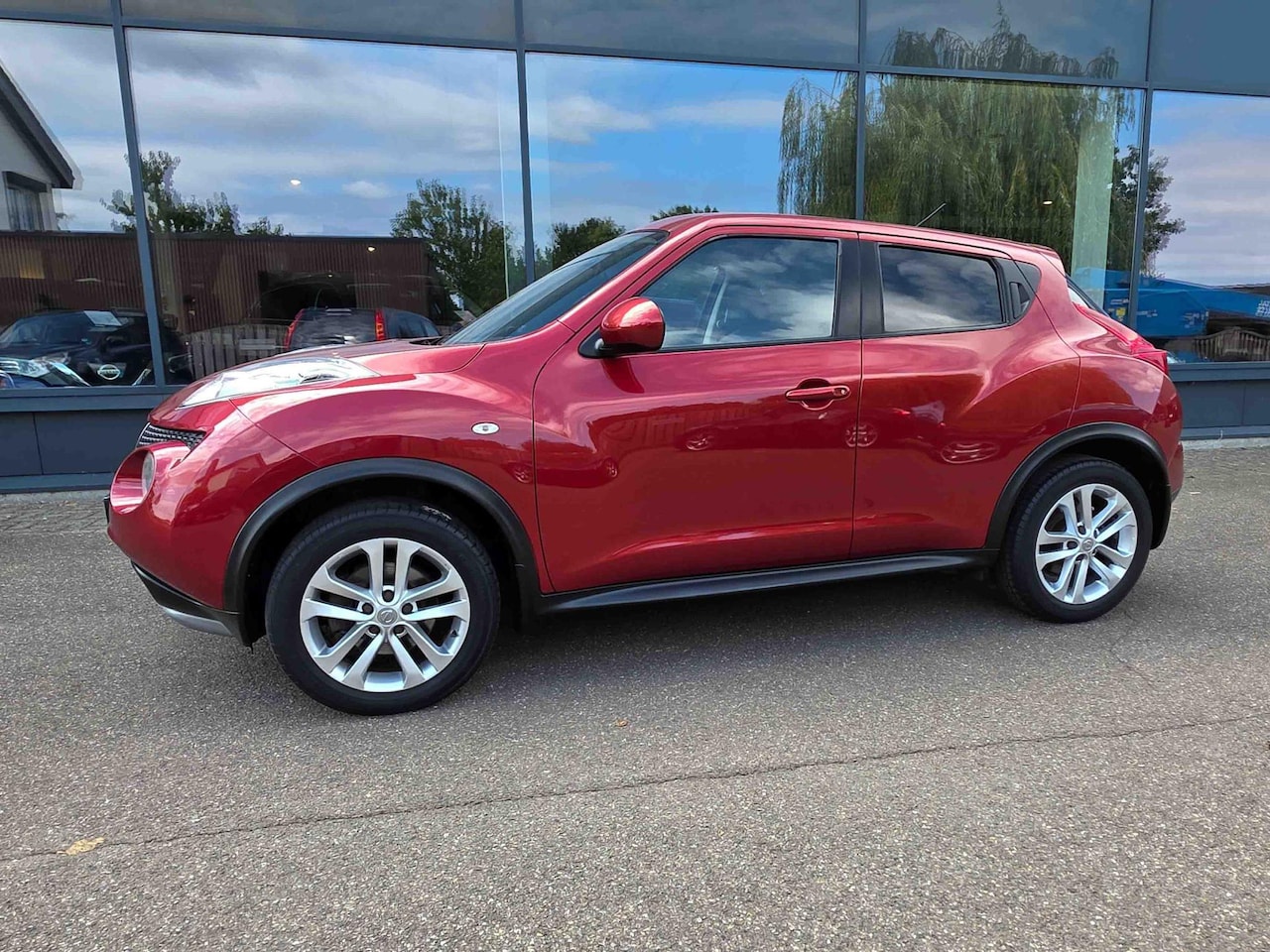 Nissan Juke - 1.6 DIG-T Tekna All-Mode 1.6 DIG-T Tekna All-Mode - AutoWereld.nl