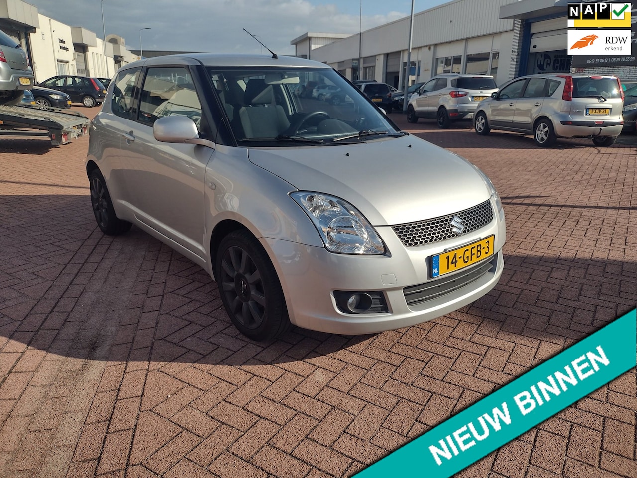 Suzuki Swift - 1.3 Exclusive MOOIE AUTO BEL 0619590613 AIRCO - AutoWereld.nl