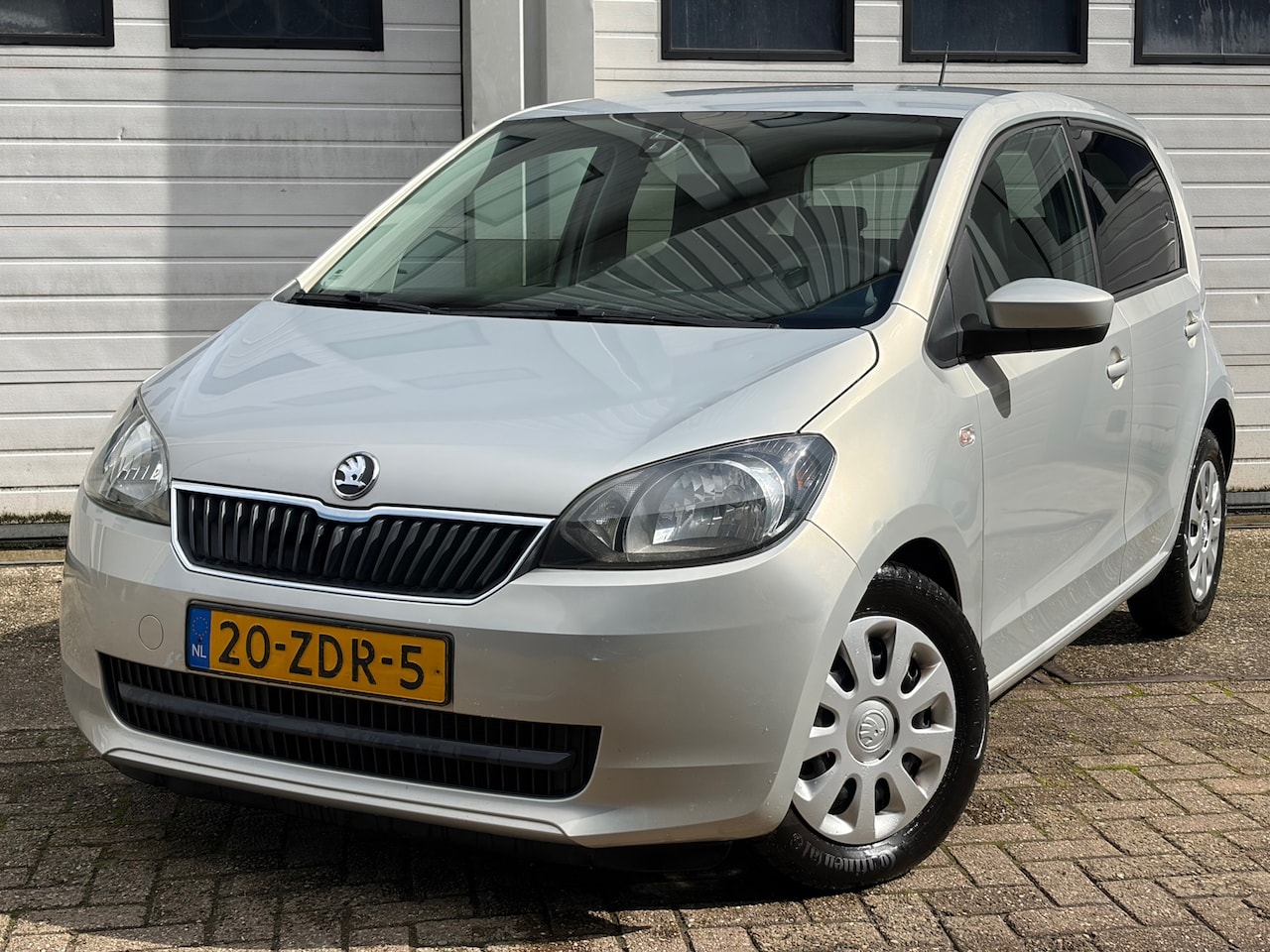Skoda Citigo - 1.0 Greentech Ambition cruise control airco stoelverwarming elektrische ramen - AutoWereld.nl