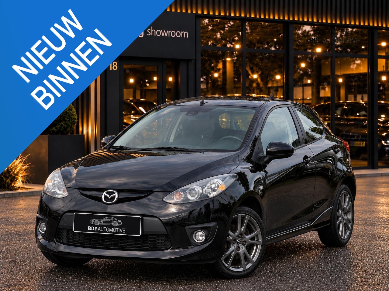 Mazda 2 - 1.3hp S-VT Touring 1.3hp S-VT Touring - AutoWereld.nl