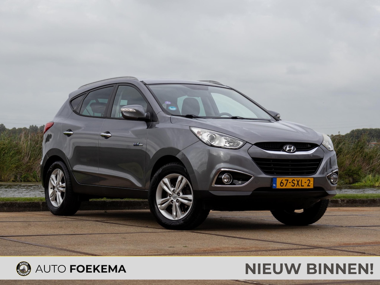 Hyundai ix35 - 1.6i GDI Style Clima Navi Cruise control - AutoWereld.nl