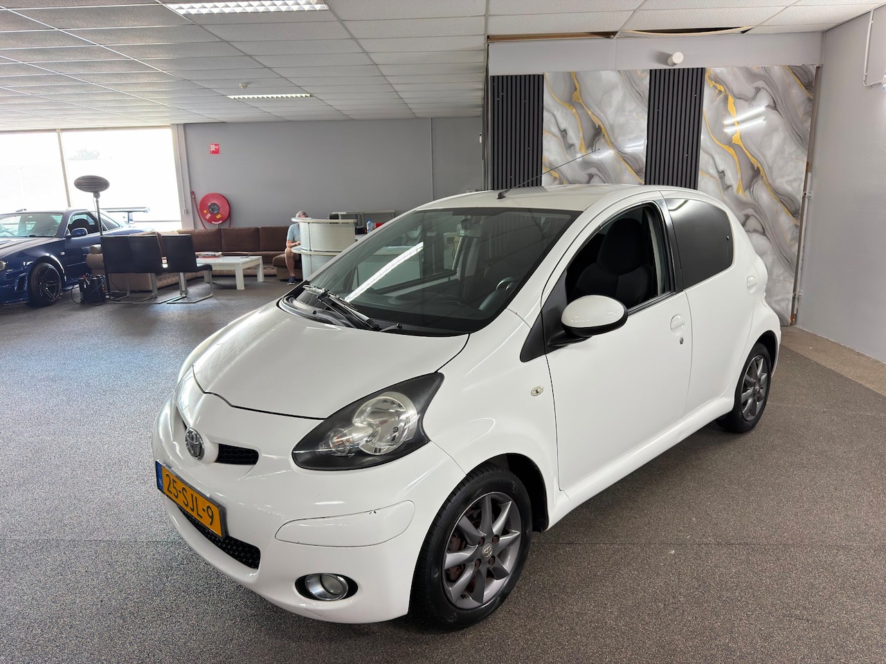 Toyota Aygo - 1.0-12V Dynamic Navigator 1.0-12V Dynamic Navigator,Airco,E-Ramen,Navigatie,Lm velgen,N.A.P,5Deurs,2sleutels+boekjes - AutoWereld.nl