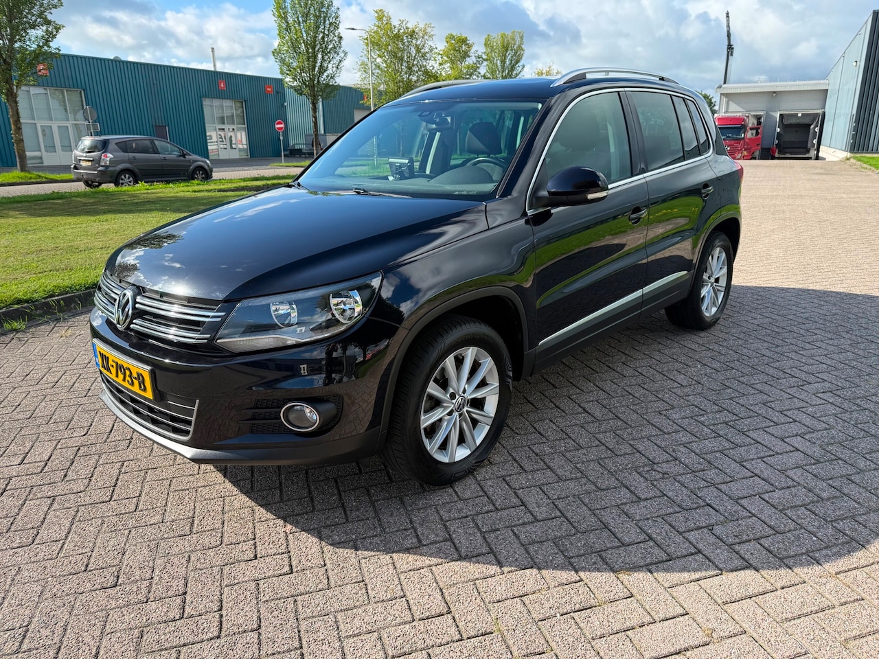 Volkswagen Tiguan - 1.4 TSI Sport&Style - AutoWereld.nl