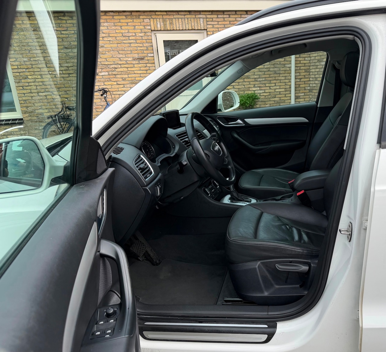 Audi Q3 - 1.4 TFSI CoD Design Pro Line Plus 1.4 TFSI CoD Design Pro Line Plus Automaat - AutoWereld.nl