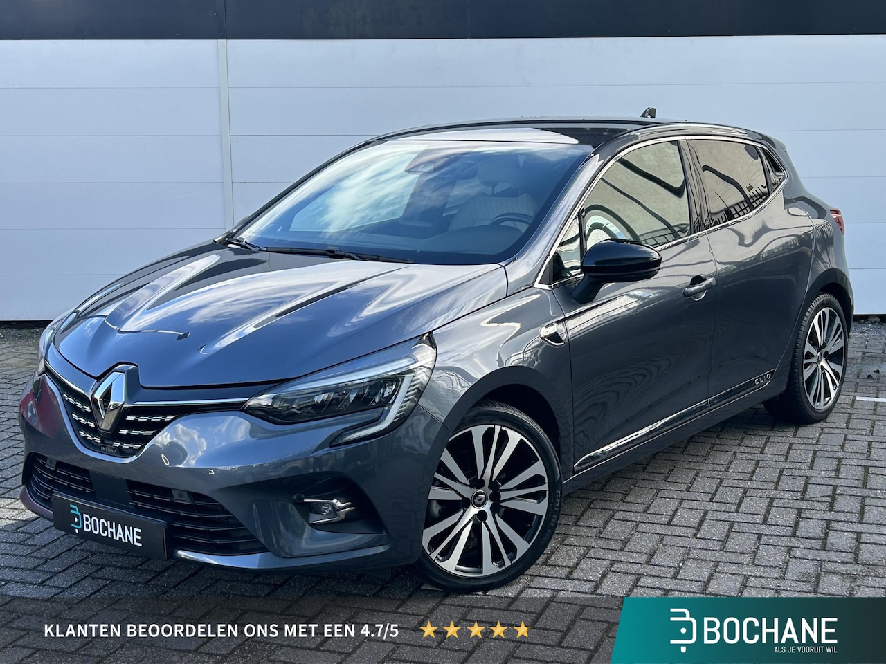 Renault Clio - 1.6 E-Tech Hybrid 140 Initiale Paris | Navigatie | Camera | Premium Audio | Verwarmbare Vo - AutoWereld.nl