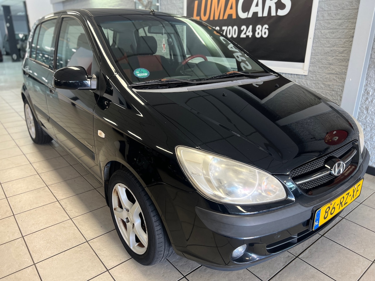 Hyundai Getz - 1.4i First Edition | Airco | 5 deurs | Trekh. | - AutoWereld.nl
