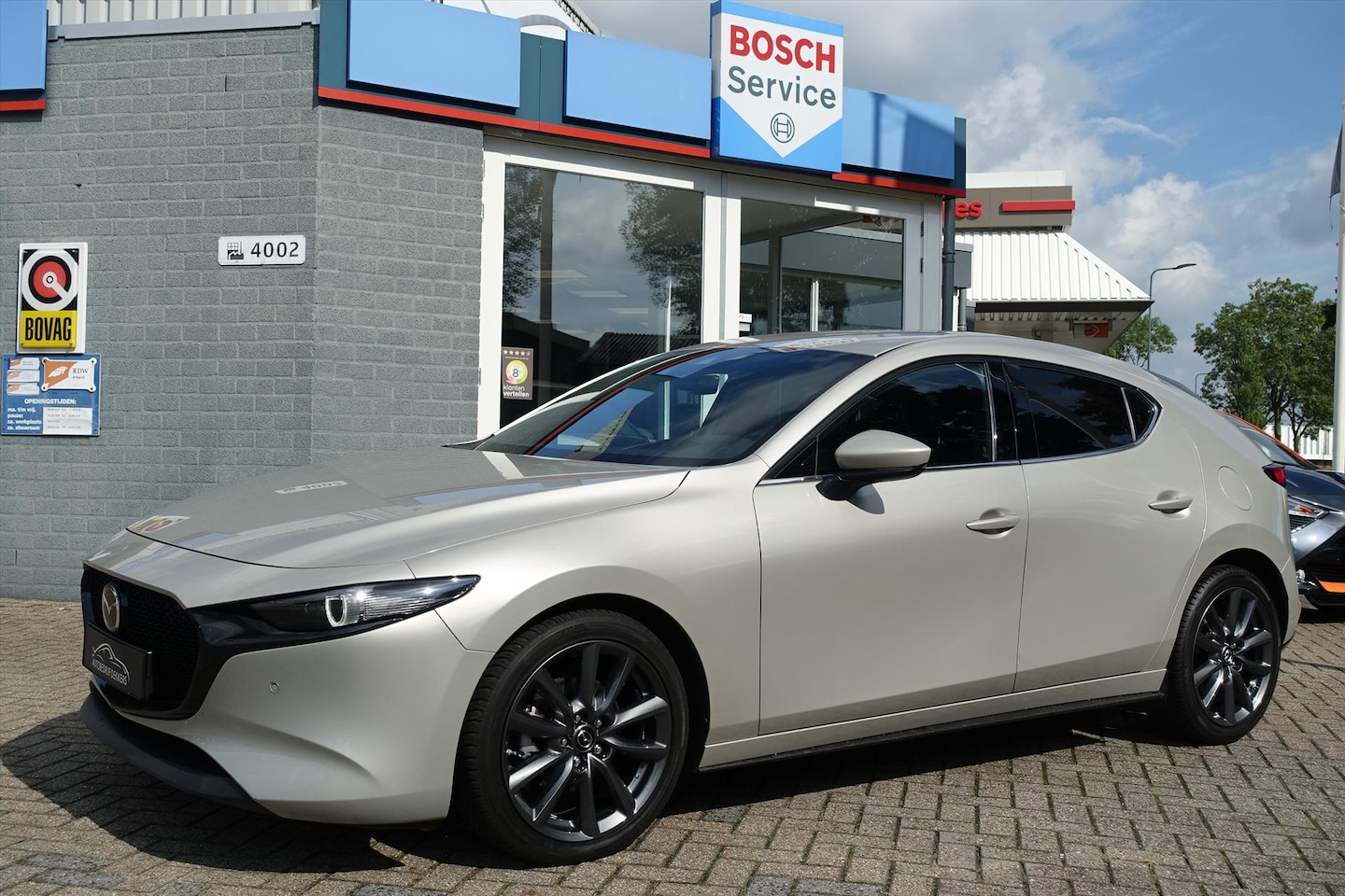 Mazda 3 - 2.0 E-SkyActiv-G Exclusive Line | LED | HUD | KEYLESS | MRCC - AutoWereld.nl
