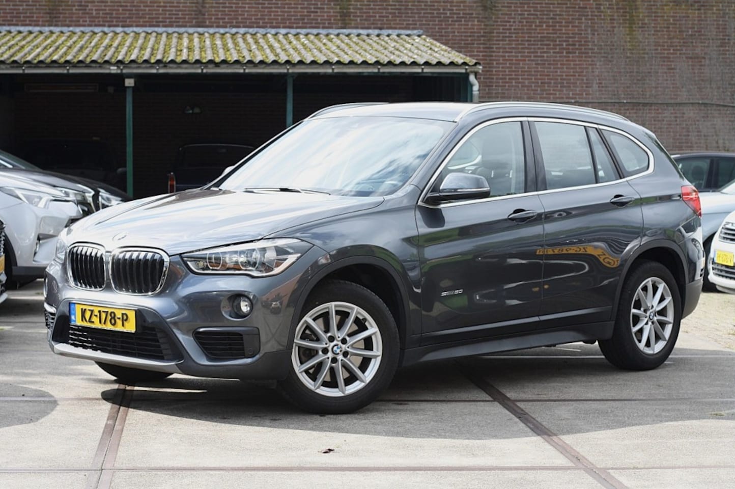 BMW X1 - sDrive20i High Executive / NAP / Nieuwstaat 1ste Eig. / Trekhaak / Leder - AutoWereld.nl