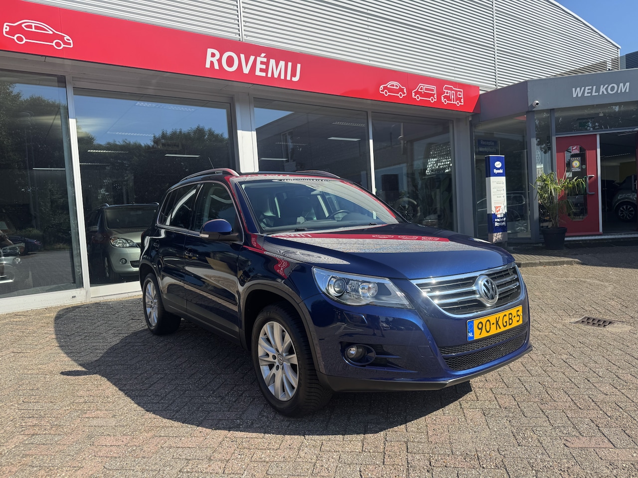 Volkswagen Tiguan - 2.0 TSI Sport&Style 4Motion Automaat, Trekhaak, Cruise, Clima - AutoWereld.nl