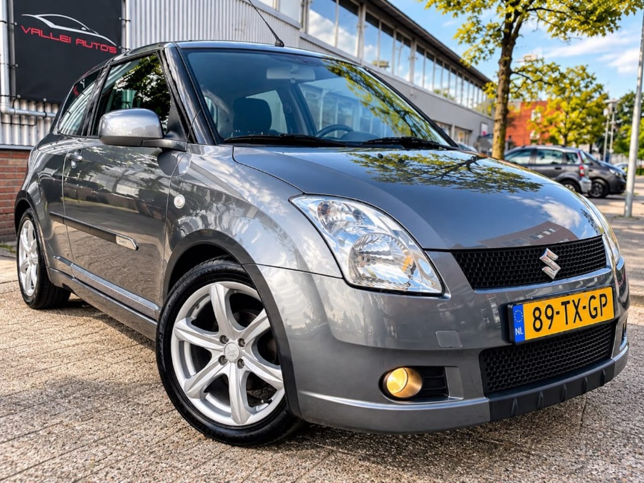 Suzuki Swift - 1.3 Exclusive AUTOMAAT AIRCO PDC KEYLESS NAP - AutoWereld.nl