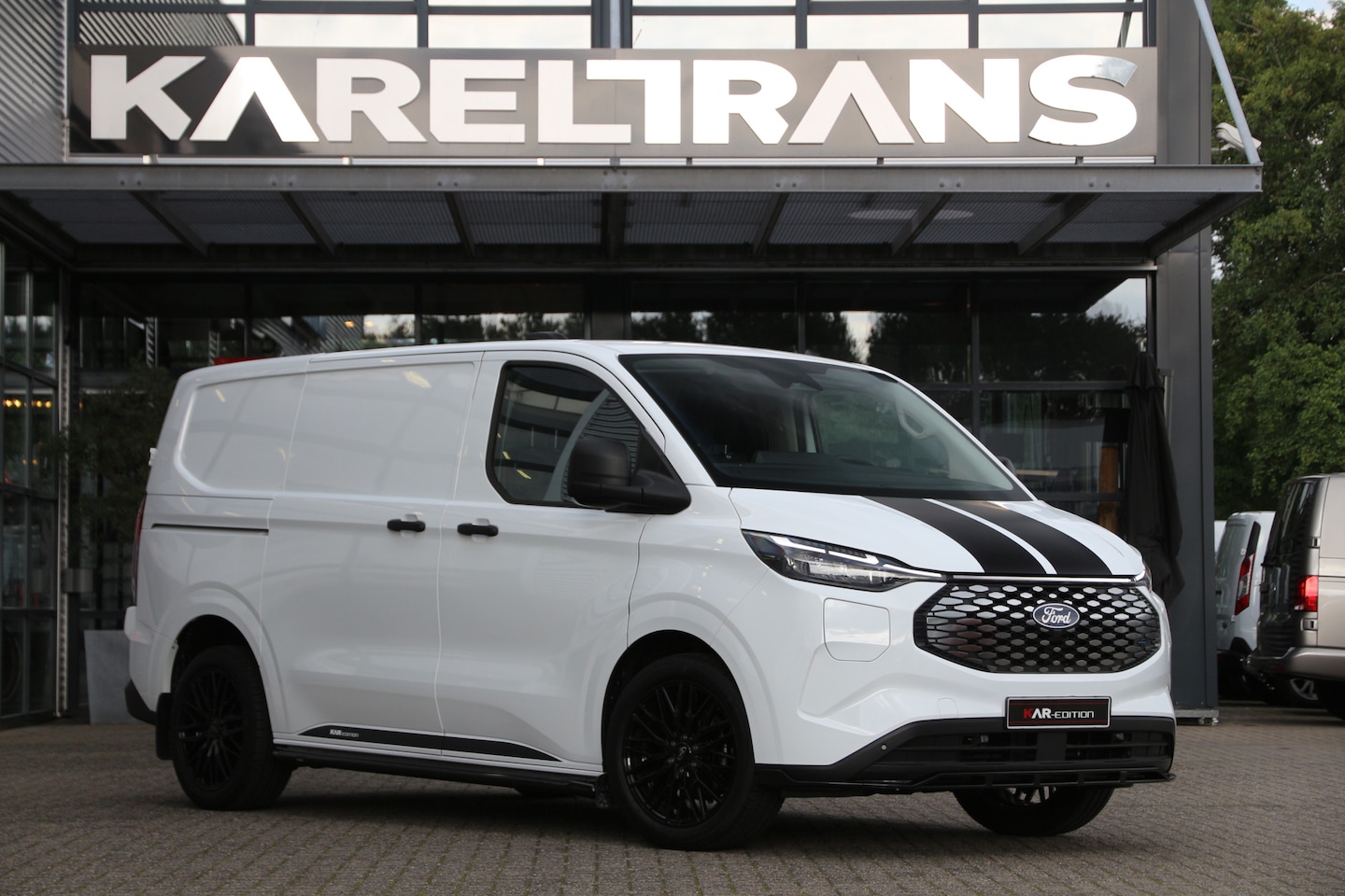 Ford Transit Custom - E-Transit 320 65kWh | 330KM WLTP | KAR-edition | Camera | Cruise | Clima.. - AutoWereld.nl
