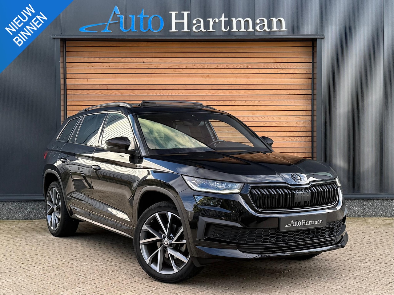 Skoda Kodiaq - 1.5 TSI Sportline Business SPORTSTOELEN|TREKHAAK|PANO|ACC - AutoWereld.nl