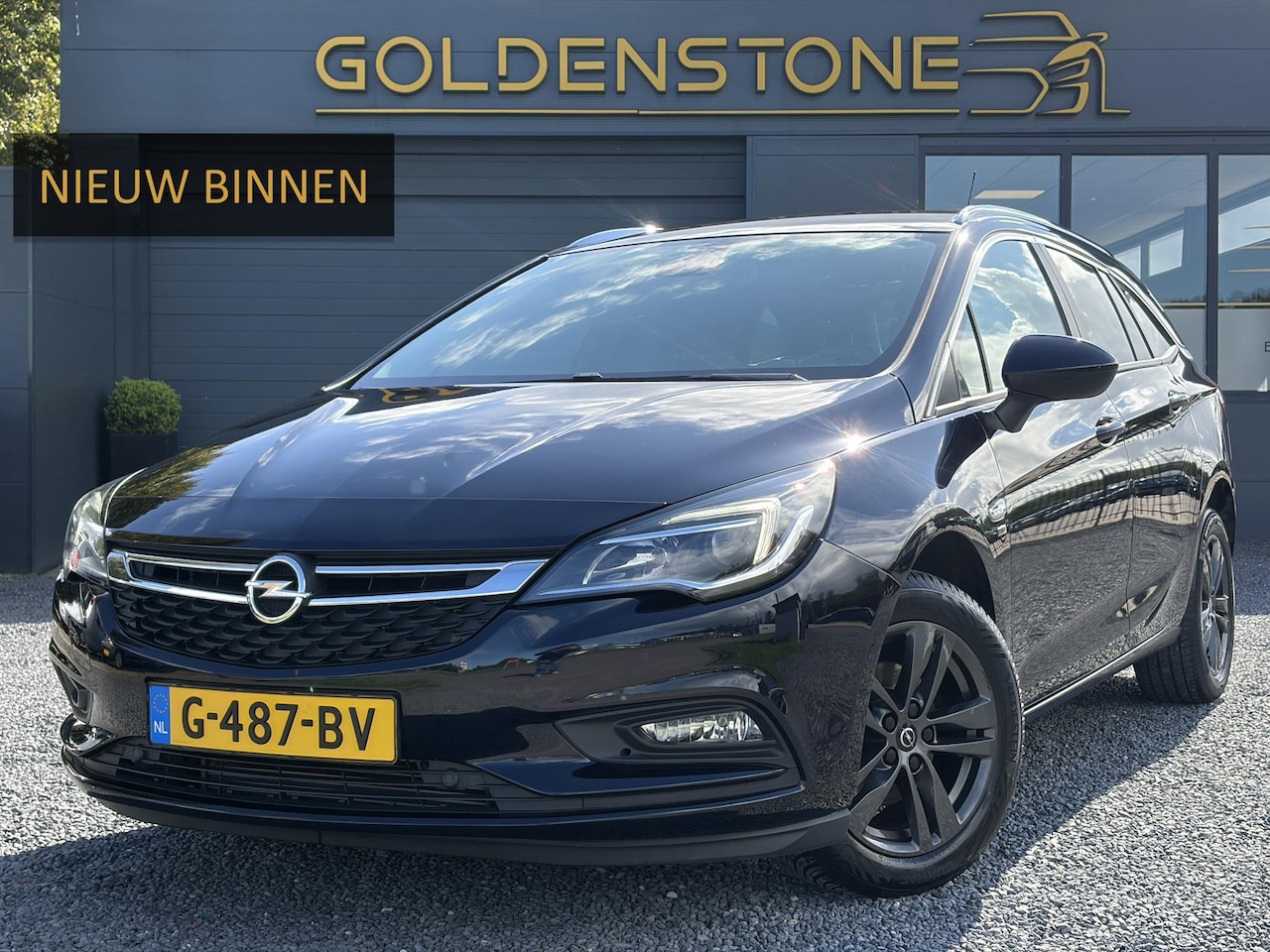 Opel Astra Sports Tourer - 1.4 Turbo 120 Jaar Edition ✓150pk✓Carplay✓Navi✓Trekhaak✓Pdc V+A✓Clima✓Cruise✓6 Bak✓Lm velg - AutoWereld.nl