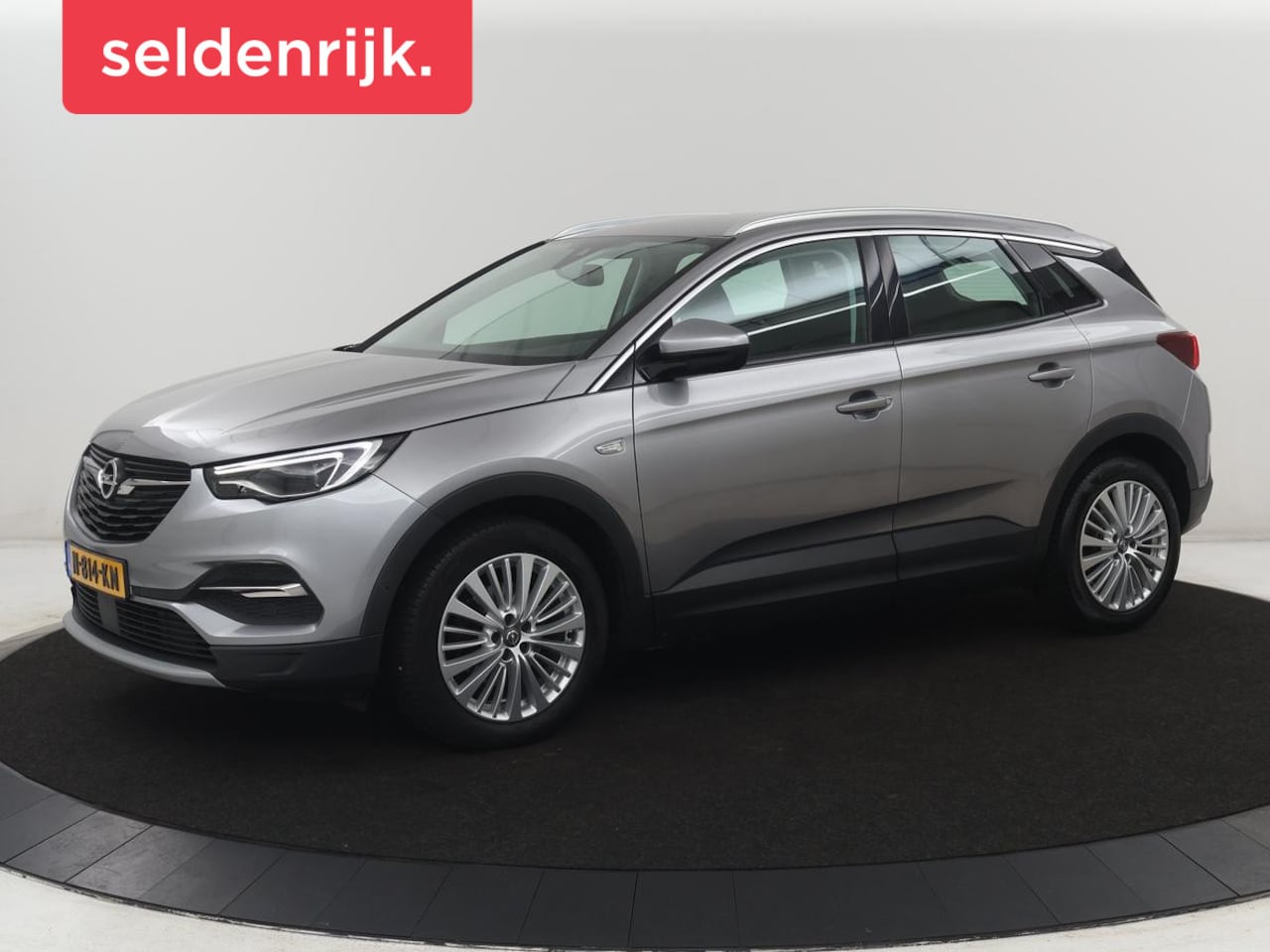 Opel Grandland X - 1.6 Turbo Innovation | Half leder | Cruise control | Trekhaak | Navigatie | Carplay | Clim - AutoWereld.nl