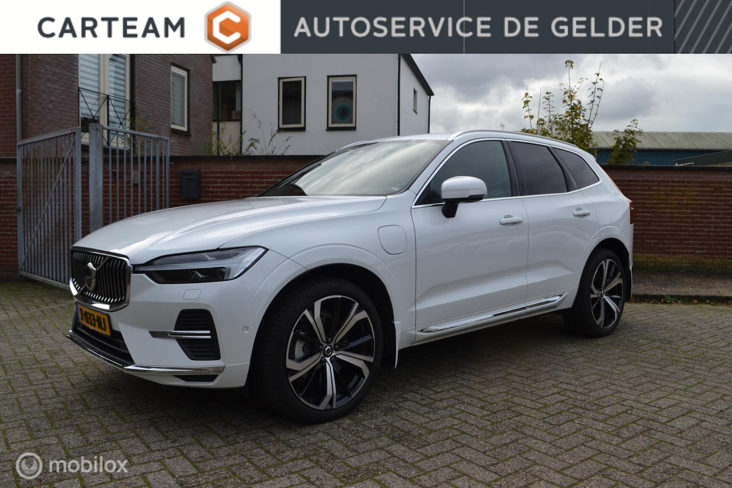 Volvo XC60 - 2.0 T6 Plug-in hybrid AWD Ultimate Bright | Head-up | Stoel + Stuurverwarming | Trekhaak | - AutoWereld.nl