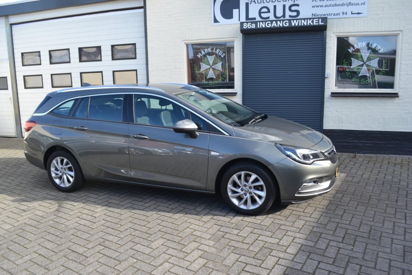 Opel Astra Sports Tourer - 1.4 Turbo S/S Volle Uitvoering - AutoWereld.nl
