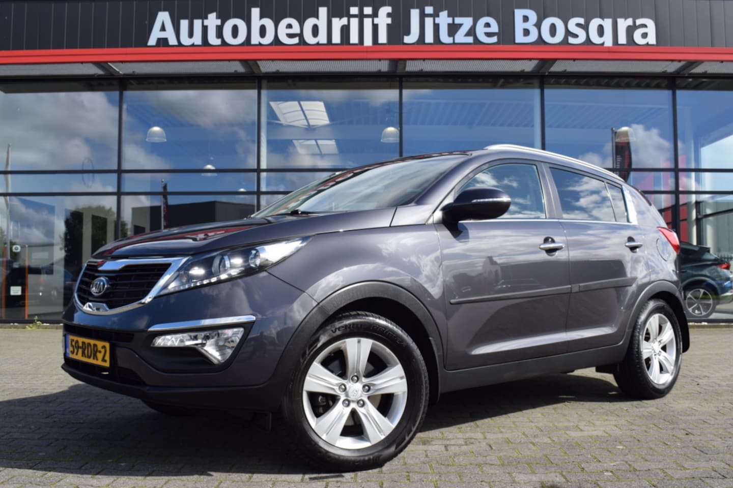 Kia Sportage - 1.6 GDI X-Ecutive Plus Pack ECC | Half Leder | Full Map Navi | Trekhaak | 17 Inch LMV - AutoWereld.nl