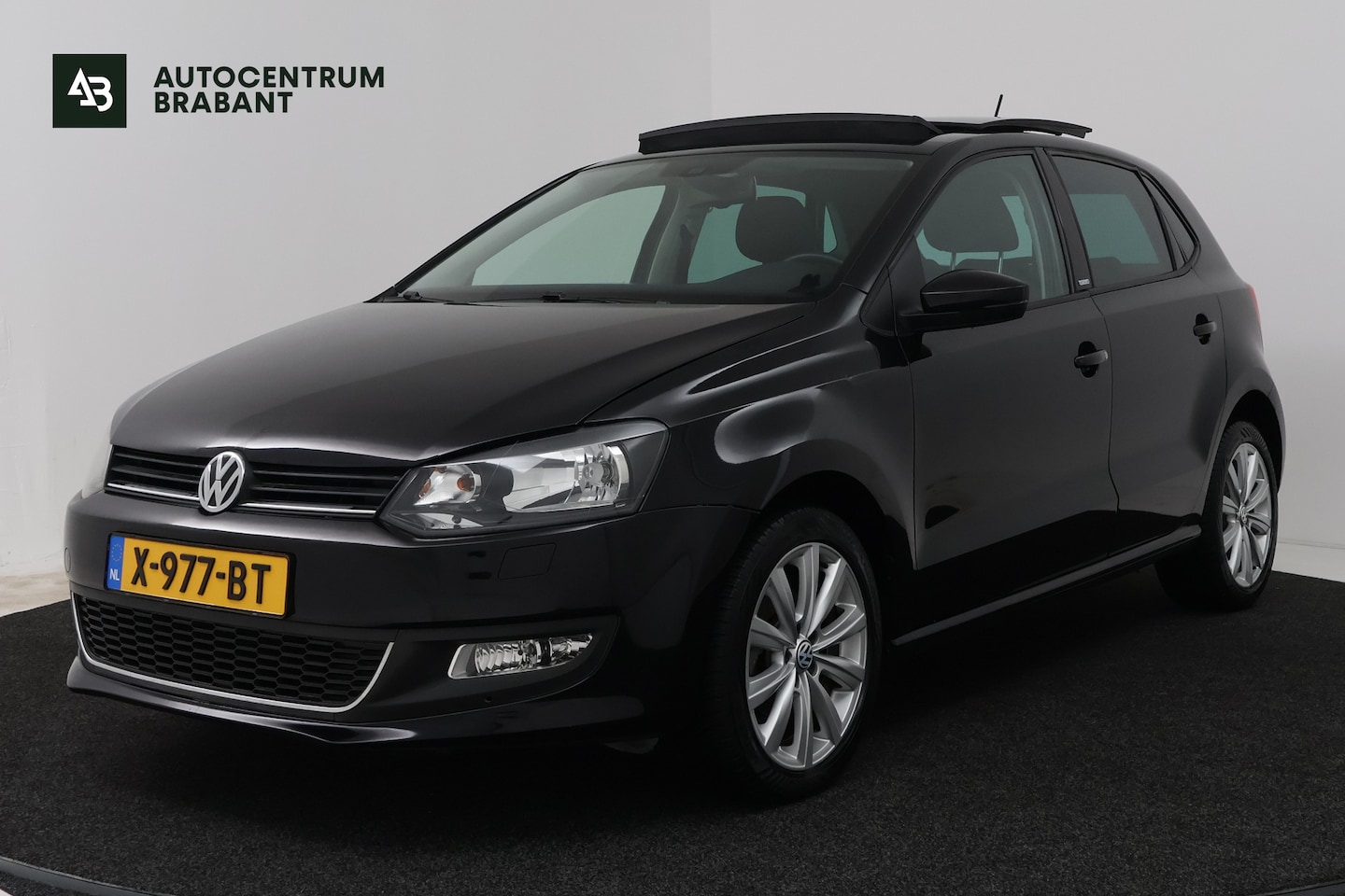Volkswagen Polo - 1.4-16V Comfortline (PANORAMADAK, STOELVERWARMING, CRUISE CONTROL, PARKEERSENSOREN) - AutoWereld.nl