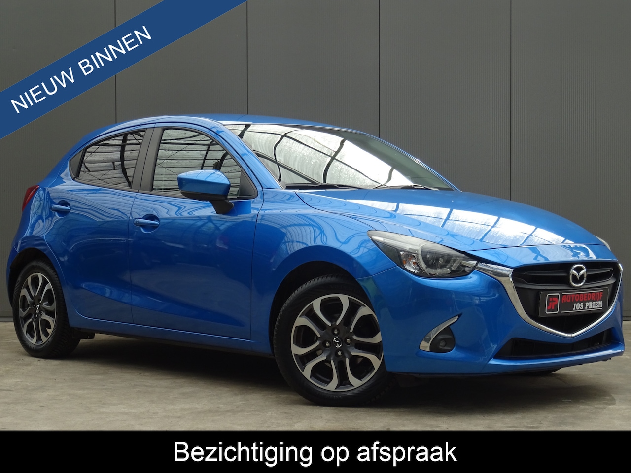 Mazda 2 - 1.5 Skyactiv-G GT-M * 4 SEIZOENSBANDEN * TREKHAAK !! - AutoWereld.nl