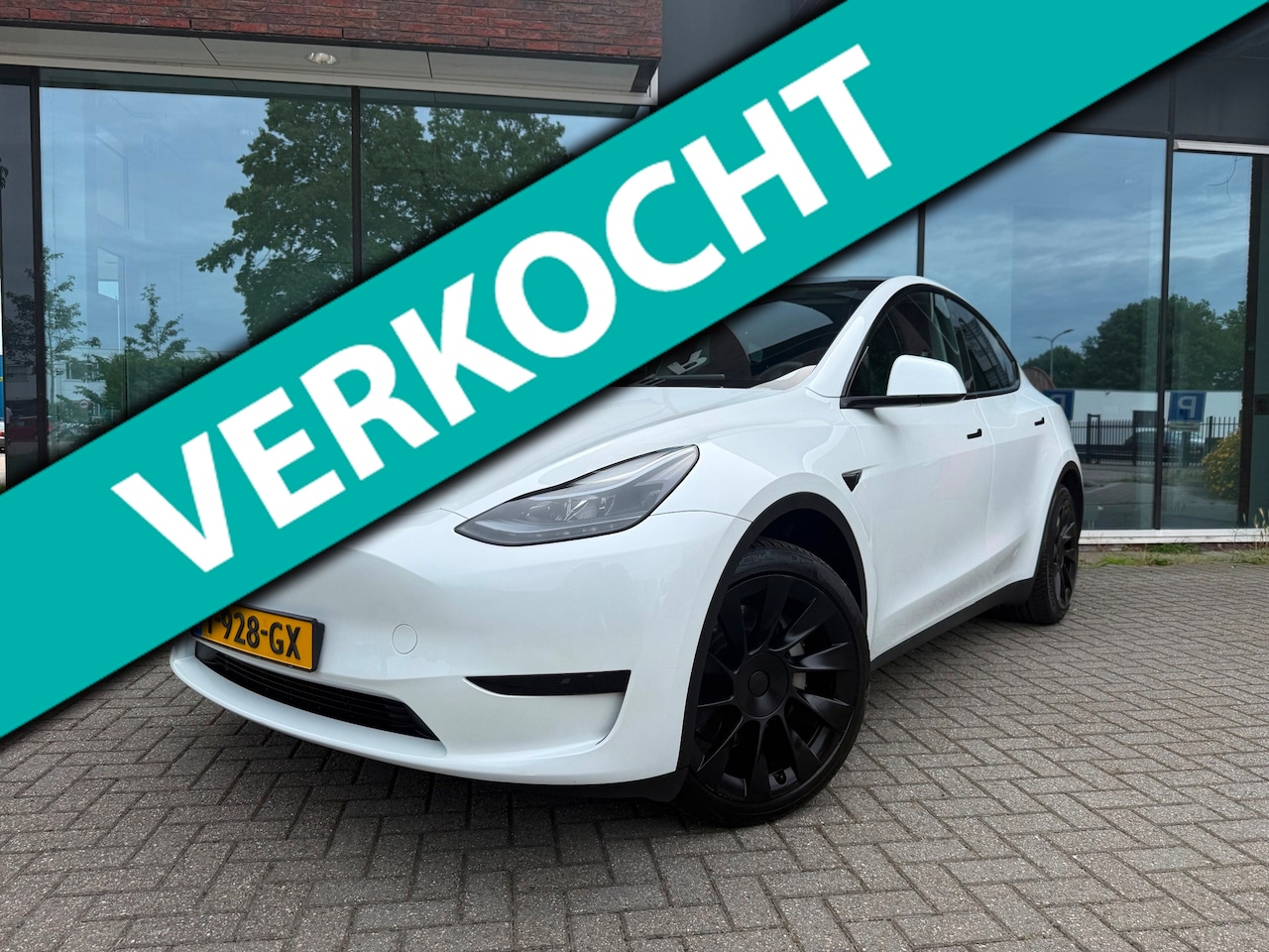 Tesla Model Y - RWD 58 kWh - Navi - Leder - Panoramadak - Org.NL - AutoWereld.nl