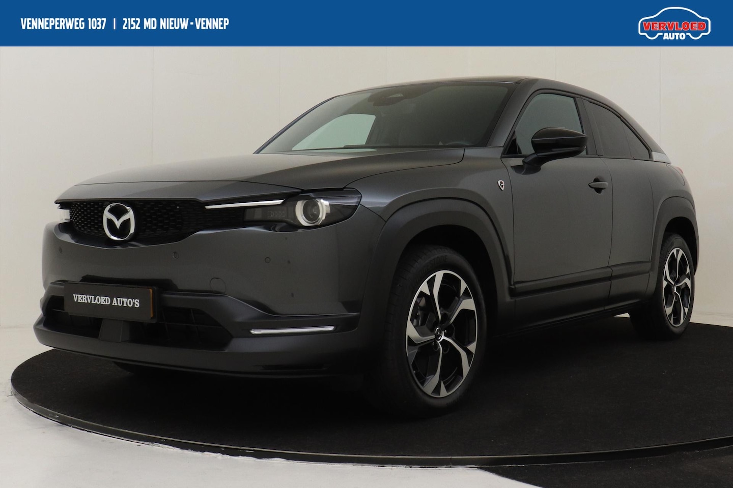 Mazda MX-30 - E-SKYACTIV R-EV 170 EXCLUSIVE-LINE -ADAP.CRUISE|HEAD-UP DISP.|STOEL/STUURVERW.|MEMORY-SEAT - AutoWereld.nl